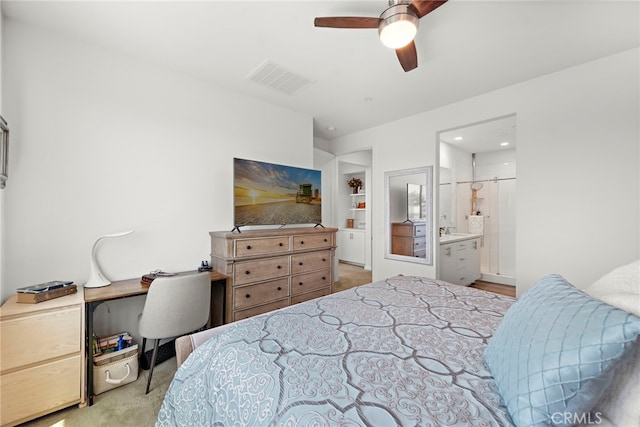 527 S Motif St, Anaheim, CA 92805 - bedroom featuring light carpet, a ceiling fan, and ensuite bathroom