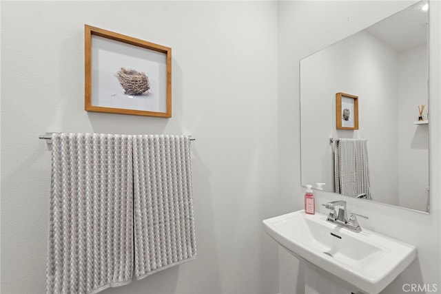 527 S Motif St, Anaheim, CA 92805 - bathroom with a sink and radiator heating unit