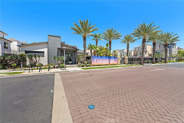 527 S Motif St, Anaheim, CA 92805 - view of decorative road featuring sidewalks, a residential view, and curbs