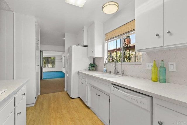 7384 Ballinger, San Diego, CA 92119 - kitchen with white appliances, healthy amount of natural light, light wood-type flooring, and white cabinetry