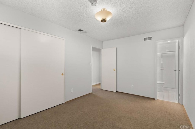7384 Ballinger, San Diego, CA 92119 - unfurnished bedroom featuring carpet, a textured ceiling, ensuite bathroom, and a closet
