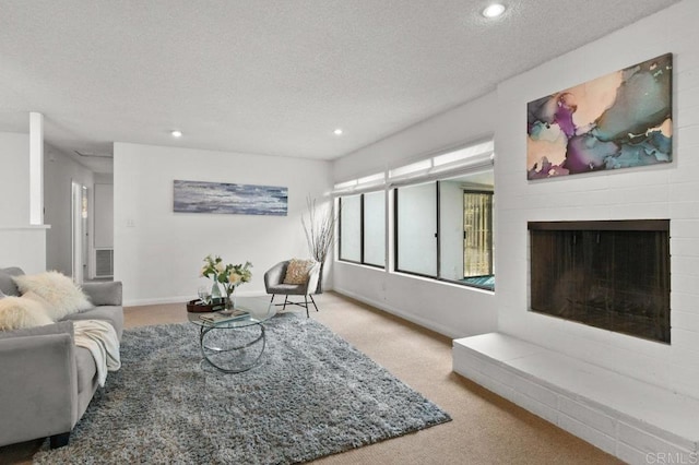 7384 Ballinger, San Diego, CA 92119 - living area with carpet, a textured ceiling, recessed lighting, and a fireplace with raised hearth