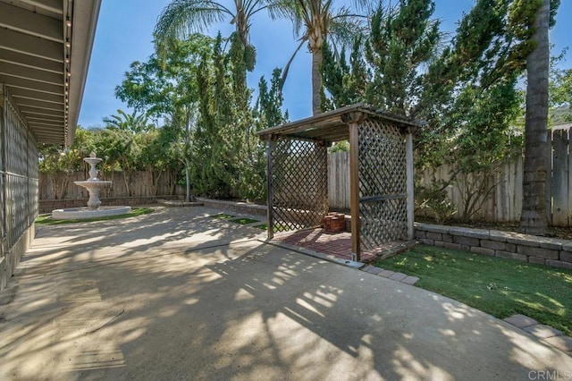 7384 Ballinger, San Diego, CA 92119 - fenced backyard featuring a patio area