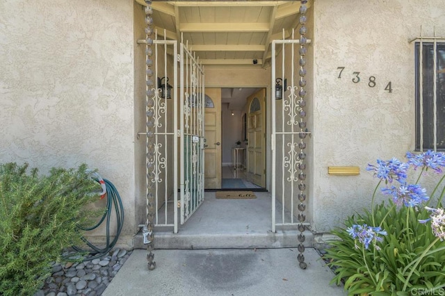 7384 Ballinger, San Diego, CA 92119 - entrance to property featuring stucco siding