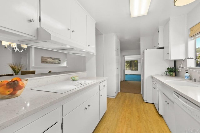 7384 Ballinger, San Diego, CA 92119 - kitchen with white appliances, light wood-style floors, and white cabinetry