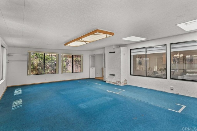 7384 Ballinger, San Diego, CA 92119 - carpeted spare room featuring a skylight