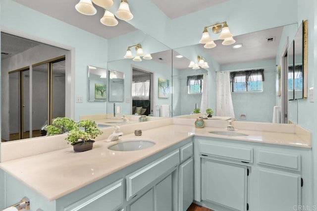 7384 Ballinger, San Diego, CA 92119 - bathroom with a chandelier, double vanity, and curtained shower