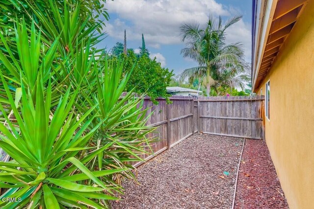  - view of fenced backyard