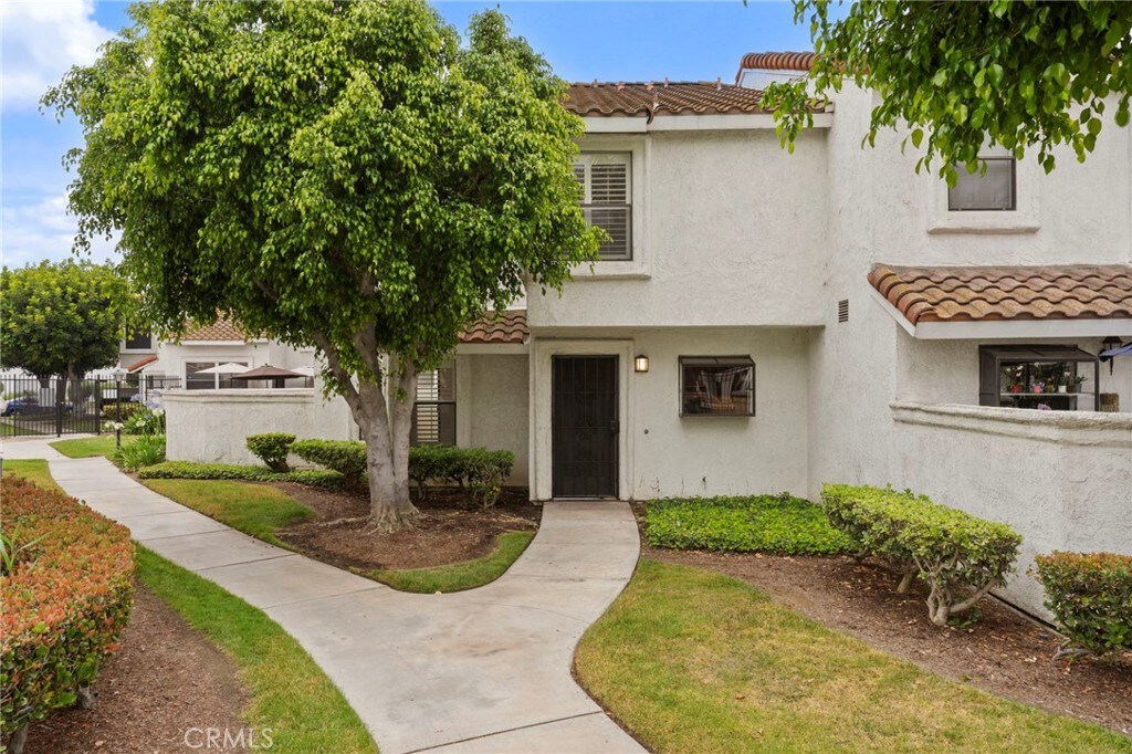 9765 Alburtis Ave Unit 131, Santa Fe Springs, CA 90670 - multi unit property featuring a tile roof and stucco siding