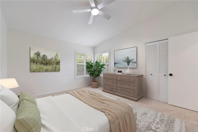 9765 Alburtis Ave Unit 131, Santa Fe Springs, CA 90670 - bedroom featuring lofted ceiling, carpet flooring, a ceiling fan, and a closet