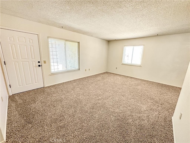 630 N 10 Th St, Blythe, CA 92225 - carpeted empty room with a textured ceiling