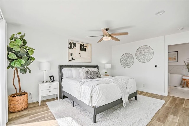 4216 Highland Ave Unit B, Manhattan Beach, CA 90266 - bedroom featuring light wood-type flooring, ceiling fan, and ensuite bathroom
