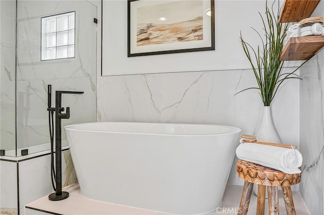 4216 Highland Ave Unit B, Manhattan Beach, CA 90266 - bathroom with tile walls and a soaking tub