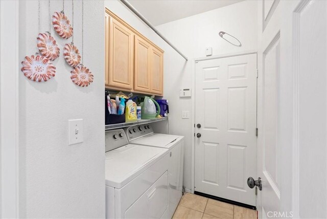 253 Kieswetter St, Colton, CA 92324 - washroom featuring washing machine and dryer, cabinet space, and light tile patterned floors