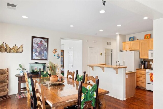 253 Kieswetter St, Colton, CA 92324 - dining area featuring dark wood-style floors and recessed lighting