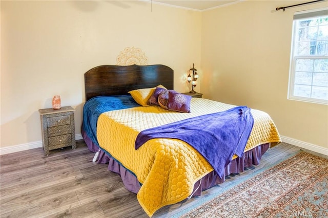 7695 Valle Ave, Atascadero, CA 93422 - bedroom featuring wood finished floors and ornamental molding