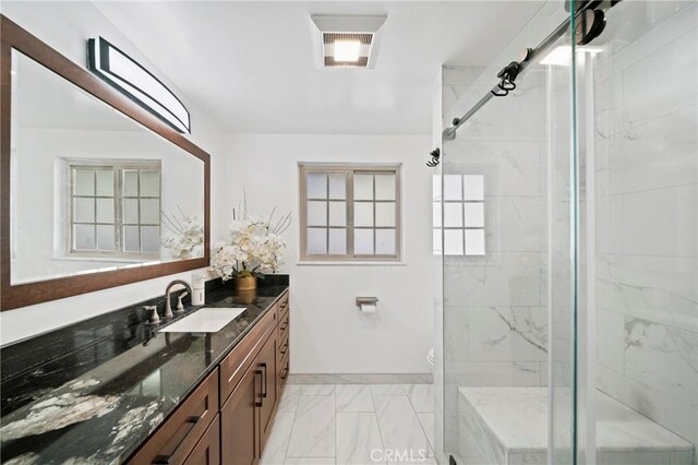 2415 Casa Grande St, Pasadena, CA 91104 - bathroom with vanity, marble look tile flooring, and a marble finish shower
