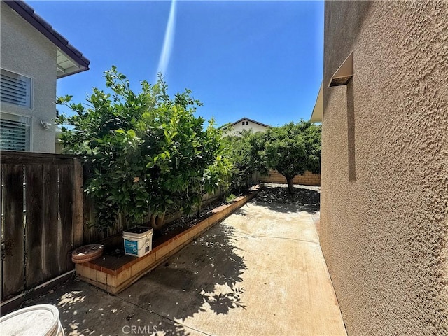13128 Pintail Ct, Chino, CA 91710 - fenced backyard featuring a patio area