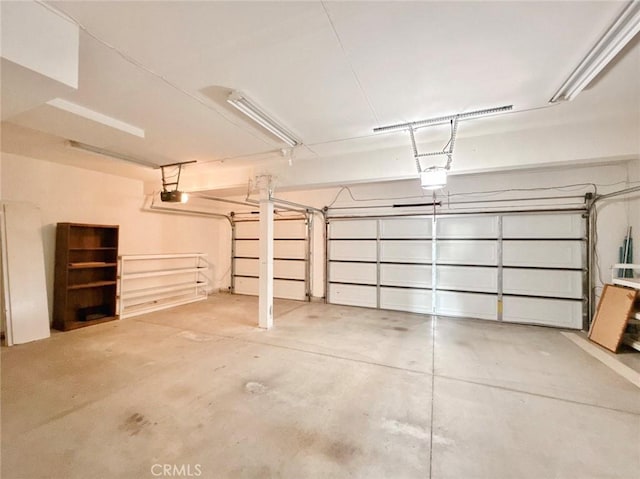 13128 Pintail Ct, Chino, CA 91710 - garage featuring a garage door opener