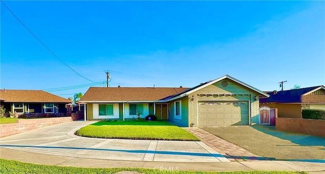 3425 Clifton Ave, Highland, CA 92346 - ranch-style home with an attached garage, brick siding, and driveway