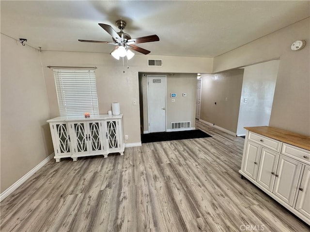 3425 Clifton Ave, Highland, CA 92346 - spare room with a ceiling fan, a smoke detector, and light wood-type flooring