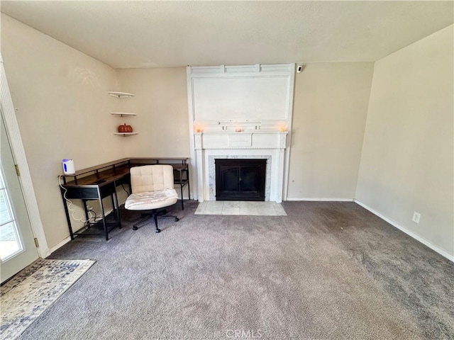 3425 Clifton Ave, Highland, CA 92346 - carpeted living area featuring a fireplace with flush hearth and baseboards
