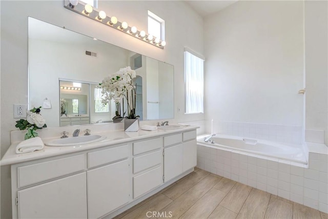 5412 Signac Ct, Chino Hills, CA 91709 - bathroom featuring double vanity and a garden tub