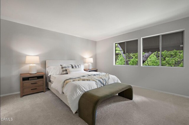 1200 S Orange Grove Blvd Unit 15, Pasadena, CA 91105 - carpeted bedroom featuring crown molding and baseboards
