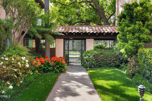 1200 S Orange Grove Blvd Unit 15, Pasadena, CA 91105 - view of front of home featuring a gate and stucco siding