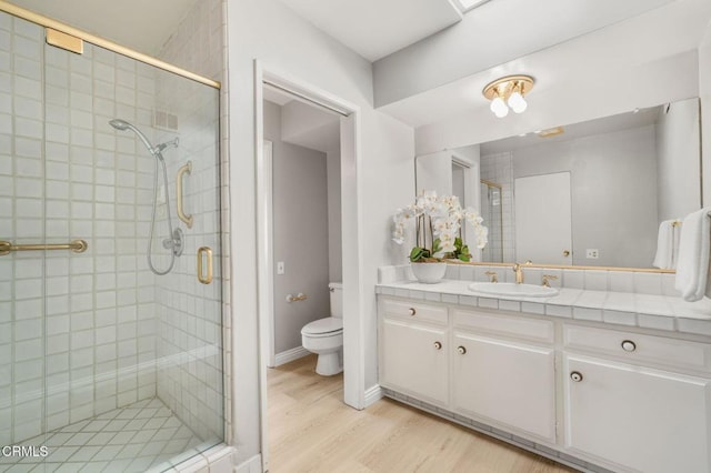 1200 S Orange Grove Blvd Unit 15, Pasadena, CA 91105 - full bath with a stall shower, vanity, and wood finished floors