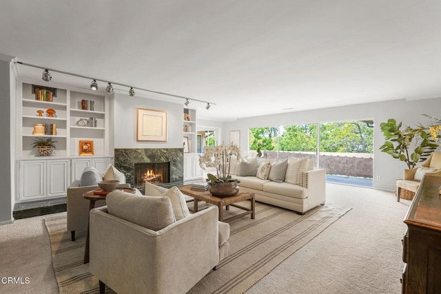 1200 S Orange Grove Blvd Unit 15, Pasadena, CA 91105 - carpeted living room with a fireplace, healthy amount of natural light, and rail lighting