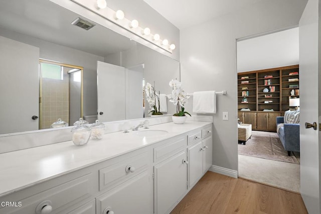 1200 S Orange Grove Blvd Unit 15, Pasadena, CA 91105 - ensuite bathroom featuring vanity and wood finished floors