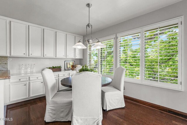 1200 S Orange Grove Blvd Unit 15, Pasadena, CA 91105 - dining room featuring dark wood-style floors and baseboards