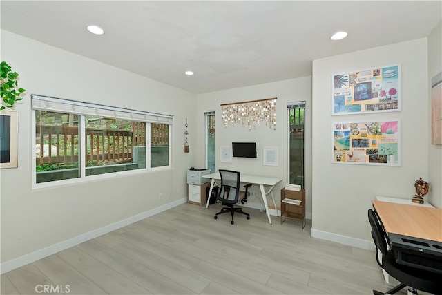 24586 Horst Dr, Crestline, CA 92325 - home office with light wood-style flooring and recessed lighting