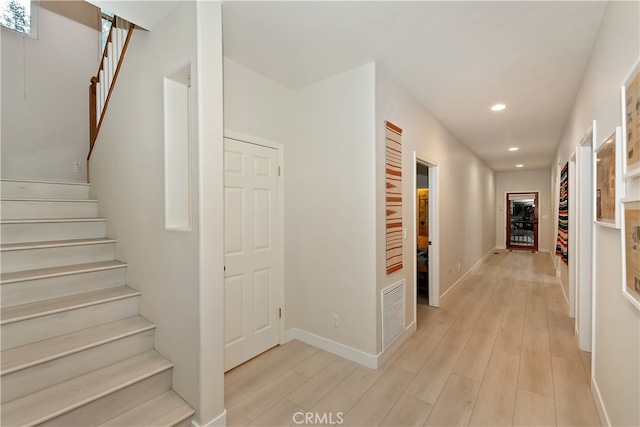 24586 Horst Dr, Crestline, CA 92325 - hall featuring stairway, recessed lighting, and light wood-type flooring