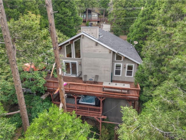 24586 Horst Dr, Crestline, CA 92325 - rear view of property with a wooden deck, a shingled roof, a chimney, and french doors
