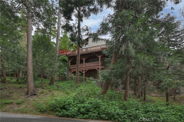 24586 Horst Dr, Crestline, CA 92325 - back of property with a wooden deck