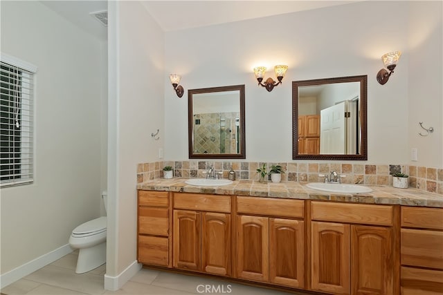 24586 Horst Dr, Crestline, CA 92325 - full bath featuring double vanity, tile patterned floors, and tiled shower