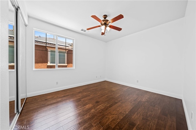 7265 Excelsior Dr, Eastvale, CA 92880 - unfurnished room with dark wood-style flooring and ceiling fan