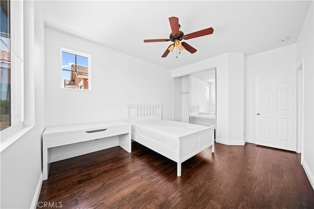 7265 Excelsior Dr, Eastvale, CA 92880 - bedroom featuring dark wood-type flooring and ceiling fan