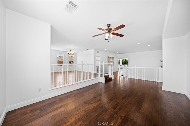 7265 Excelsior Dr, Eastvale, CA 92880 - unfurnished living room featuring ceiling fan, wood-type flooring, a chandelier, and recessed lighting