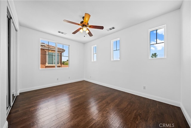 7265 Excelsior Dr, Eastvale, CA 92880 - unfurnished bedroom featuring dark wood-type flooring and a ceiling fan