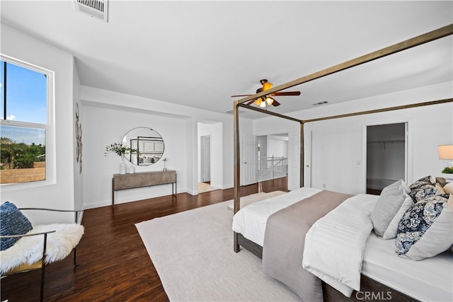 7265 Excelsior Dr, Eastvale, CA 92880 - bedroom featuring dark wood-type flooring and a ceiling fan