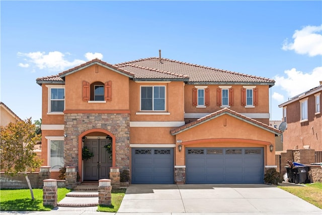 7265 Excelsior Dr, Eastvale, CA 92880 - view of front facade featuring a garage, stone siding, stucco siding, and concrete driveway