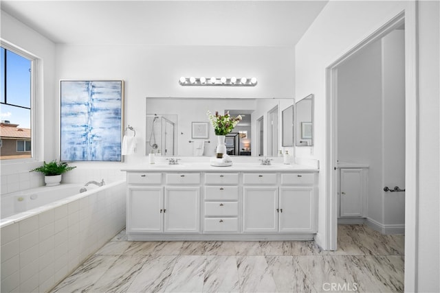 7265 Excelsior Dr, Eastvale, CA 92880 - full bathroom with a stall shower, double vanity, a garden tub, and marble finish flooring