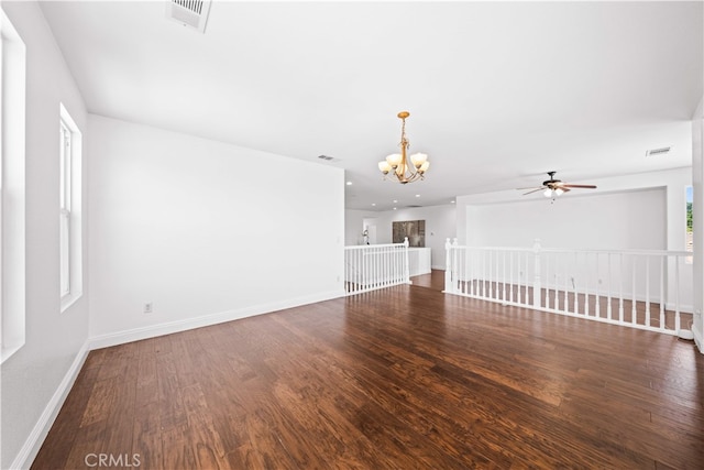 7265 Excelsior Dr, Eastvale, CA 92880 - empty room featuring a chandelier, wood finished floors, and a ceiling fan