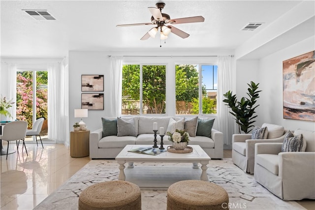 7265 Excelsior Dr, Eastvale, CA 92880 - living room featuring plenty of natural light, ceiling fan, and light tile patterned flooring