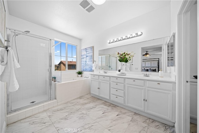 7265 Excelsior Dr, Eastvale, CA 92880 - bathroom with marble look tiles, a garden tub, a stall shower, double vanity, and ceiling fan