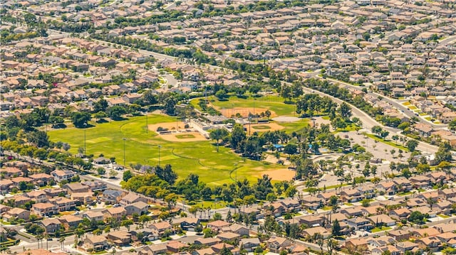 7265 Excelsior Dr, Eastvale, CA 92880 - aerial view of property's location with a golf course and nearby suburban area