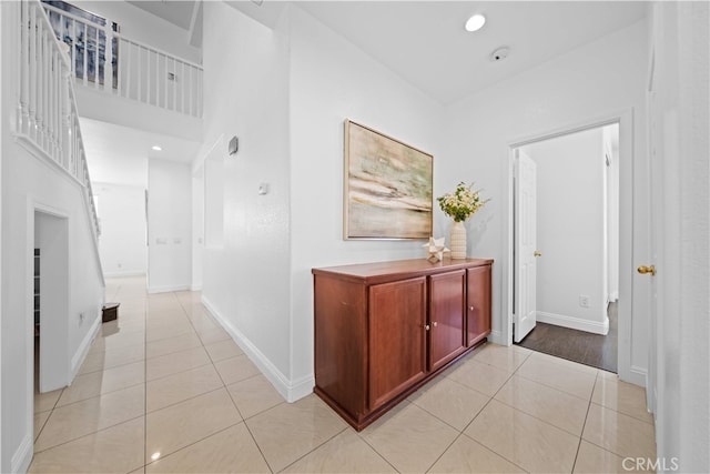 7265 Excelsior Dr, Eastvale, CA 92880 - hallway featuring light tile patterned flooring and recessed lighting